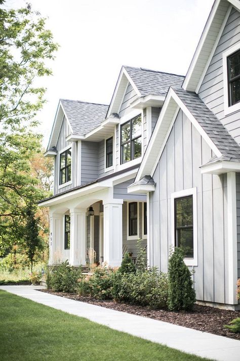 Love this light gray color Light Grey Board And Batten Exterior, Gray House With White Trim, Light Grey Farmhouse Exterior, Gray Farmhouse Exterior, Grey Farmhouse Exterior, House With White Trim, Grey Exterior House Colors, Exterior House Siding, Board And Batten Exterior