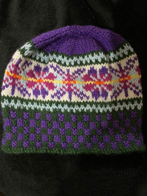 Picture of hand knitted Aran fair isle patterned hat, predominantly in deep purple, dark green, raspberry, light blue and white. Love Crafts, Fair Isle Hat, Love Craft, Hat Pattern, Fair Isle, Knitted Hats, Yarn, Wool, Knitting