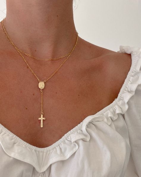 Rosary inspired lariat necklace. Features a centered 14k gold filled miraculous medal and 14K gold filled crucifix, paired with a dainty GF chain. Adjustable 16-18in. Nickel and lead free. Composed entirely with 14K gold filled materials - extremely tarnish resistant.