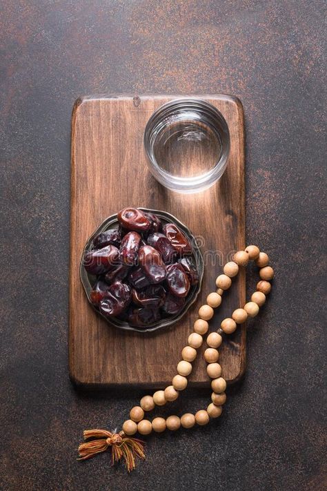 Ramadan. Dates in bowl, glass of water, wooden prayer beads on brown. Eid Mubara #Sponsored , #Sponsored, #AD, #bowl, #Ramadan, #Dates, #glass Ramadan Photography, Dates Ramadan, Ramadan Dates, Islamic Photo, Arabic Dessert, Dark Nature, Ramadan Decoration, Dark Nature Aesthetic, Glass Of Water