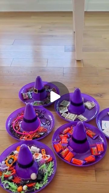 Britni V | Play Party Plan on Instagram: "Ring around the witch hat! 🧙😆 Grab them to play this witchy Halloween game next time you’re at Dollar Tree!   Try adding cash, lotto tickets, gift cards, movie tickets, and more to make it work for adults! Or teens (without the lotto tickets 😬)!   Want full details plus more Halloween games?? Comment Halloween Games and I’ll DM you our favorites! 🎃💀👻  Or comment WITCH RINGS and I’ll send you a link to the rings I used!  Or just check out https://www.playpartyplan.com/easy-halloween-party-games/  #halloweengame #halloweengames #halloweenfun #halloweenparty #gamesforkids #dollartreefinds #classparty #fungames #partygames" Halloween Donut Game, Witch Pitch Game, Prizes For Halloween Party, Witch Theme Games, Halloween Game Prizes, Witches And Wizards Party, Teen Halloween Party Games, Halloween Ring Toss, Witch Hat Ring Toss