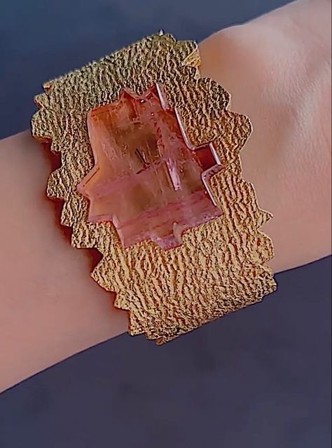 Hammered Gold Cuff Watch by Jewellery Designer Andrew Grima made in collaboration with Omega. It has an asymmetric shape and a pink dial in hard stone Andrew Grima, Futuristic Watches, Andy Warhol Art, Cuff Watch, Antique Watches, Jewellery Designer, Hammered Gold, Gold Cuffs, Telling Time