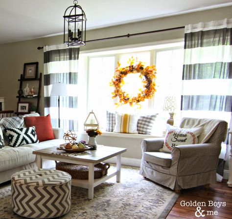 Summer living room with striped drapes, lantern light and Ikea sofa and chair-www.goldenboysandme.com Ikea Hemnes Coffee Table, Striped Drapes, Golden Boys And Me, Desk Chair Diy, Lantern Light Fixture, Ikea Chairs, Small Grey Bedroom, Ikea Interior, Hanging Chair From Ceiling