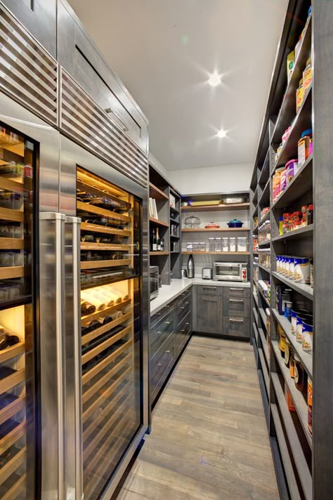 This state of the art walk in pantry includes ample storage, dual wine refrigerators, a Caesarstone  countertop for extra work space, and plenty of open shelving for dry foods storage. Luxury Pantry, Walk In Pantry Ideas, Pantry Layout, Dream Pantry, Pantry Room, Desain Pantry, Kitchen Organization Pantry, Kitchen Pantry Design, Prep Kitchen