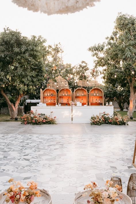 Floral wedding bar decor | Acre Resort wedding Sunriver Resort Wedding, Wedding Bar Decor, Sunriver Resort, Tropical Wedding Decor, Romantic Resorts, Wedding Bar, Resort Wedding, Tropical Wedding, Wedding Arch