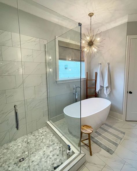 10 Best Bathroom Lighting Design Ideas | The Family Handyman Over Tub Lighting, Bathroom Chandelier Over Tub, Light Over Tub, Bathtub Chandelier, Bathroom Chandelier Lighting, Bathroom Hanging Lights, Bathtub Lighting, Tub Lighting, Bathroom Lighting Ideas