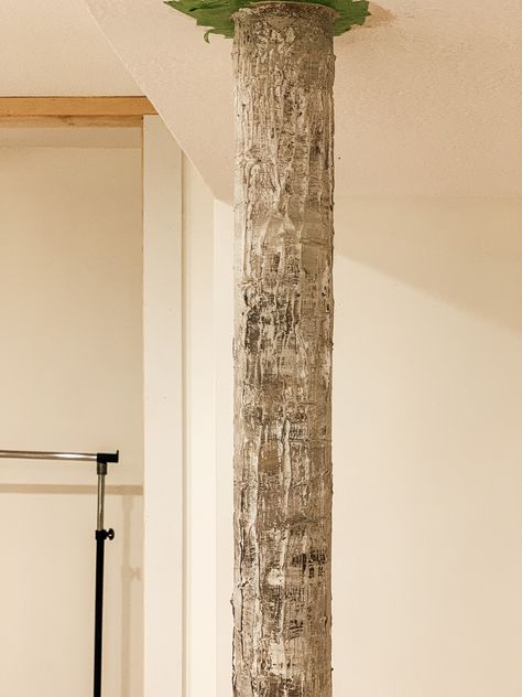 Inexpensive Way to Update Basement Pole How To Hide Basement Poles, How To Cover Basement Poles, Hide Basement Pole, Basement Poles Ideas, Pole Covering Ideas, Basement Pole Wrap Ideas, Plumbing Cover Ideas, Basement Post Covers Ideas, Basement Support Pole Ideas