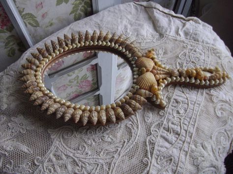 Image from: http://www.ebay.co.uk/itm/DIVINE-VINTAGE-FRENCH-SHELL-BOUDOIR-LOOKING-GLASS-HAND-MIRROR-SO-PARIC-CHIC-/330896434322?pt=UK_Collectables_VanityCollectables_SM=item4d0af6e492 Hand Mirrors, Mermaid Accessories, Shell Chandelier, Sailors Valentine, Sky Art Painting, Collections Of Objects, Dark Home Decor, Work Boxes, Rock Painting Patterns