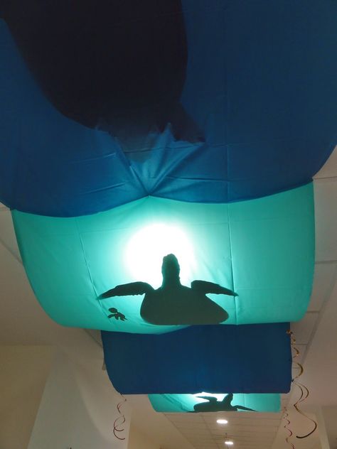 25 Beach Classroom Theme Ideas - WeAreTeachers Finding Dory Birthday Party Ideas, Dory Birthday Party Ideas, Classroom Light Covers, Ocean Ceiling, Downstairs Hallway, Beach Classroom, Finding Dory Birthday Party, Submerged Vbs, Ocean Commotion