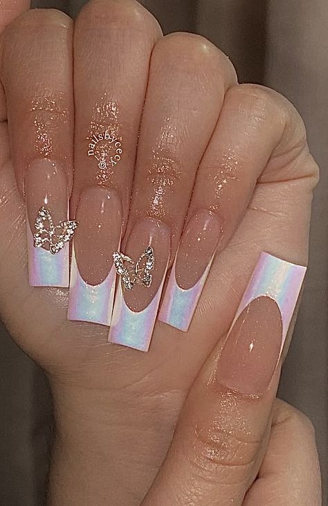 Chrome French Tip Nails With Charms, Chrome French Tip Nails With Gems, Chrome White Nails French Tip, Trendy Nails With Charms, Birthday Nails Butterflies, Iridescent White French Tip Nails, Nail Designs With Butterfly Charms, Butterfly Inspo Nails, Chrome Nails Pink French