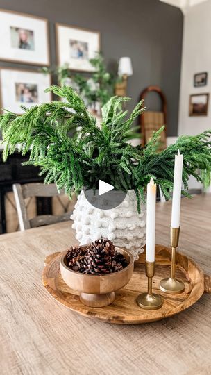 126K views · 1.9K reactions | Winter centerpiece idea! ❄️ Comment SHOP for a link! I’m almost finished taking down my Christmas decor and created this winter centerpiece using my favorite pine stems and a bowl of pinecones. I was ready for a change but still wanted to have a bit of winter decor up in the house. Have you changed out your decor yet? TO SHOP THIS POST: ✨Comment SHOP for a direct link to be sent to your DMs ✨Click on the link in my bio “Shop my home and favs” #winterdecor #diningroomdecor #diningroomdesign #neutraldecor #neutralhome #transitionalstyle #transitionaldecor #centerpiecesideas #traystyling #targetstyle #mytargetstyle #targetfinds Winter decor | Target target finds | centerpiece ideas | transitional decor | winter refresh | Anthropologie | tray styling | win Winter Table Tray, Brush Christmas Tree Centerpiece, Winter Coffee Table Decor Trays, Small Winter Branches Table, Winter Stems In Vase, Winter Tray, Winter Centerpiece, Winter Centerpieces, Tray Styling