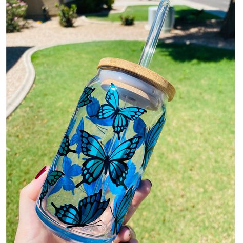 This Holographic Butterfly Glass Can is the perfect gift or the perfect treat for yourself. **16oz GlassCan **Add a bamboo lid and clear glass straw for an additional charge. **Design is applied with high quality permanent vinyl  **Listing is for 1 can glass ONLY - Bamboo Lid & Clear Glass Straw for additional charge Cup Measures 5.25" x 3" Care instructions: **Hand wash only **Don't scrub vinyl  **Do not microwave  **Not dishwasher safe ** I don't accept returns or exchanges. Please feel free t Decorated Jars Ideas, Butterfly Cup, Glass Tumbler Design, Holographic Butterfly, Libbey Glasses, Hello Kitty Shoes, Cute Coffee Cups, Cute Water Bottles, Pretty Mugs