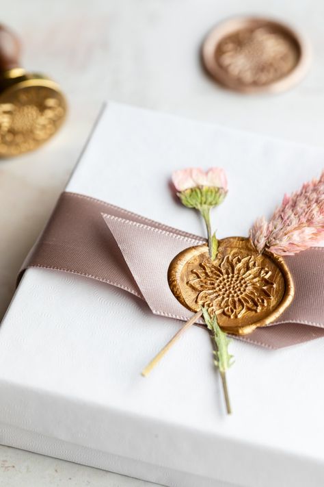 Gift Wrapping Ideas with Wax Seals | First Day of Home Wax Seal Wrapping Ideas, Wax Seal Aesthetic, How To Make Potpourri, Microwave Flower Press, Wax Seal Ideas, Milk Glass Cake Stand, Pomander Balls, Gold Christmas Tree Decorations, Elegant Gift Wrapping