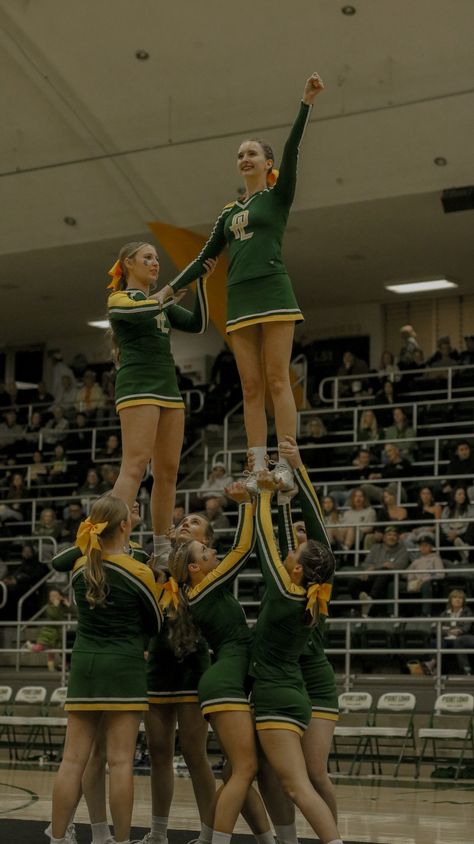 #cheerleading #cheer #plnu #plnucheerleading #schoolspirit #green&gold #pointlomanazareneuniversity Green Cheerleader Aesthetic, Hufflepuff Cheer Uniform, Cheerleading Outfits Aesthetic, Green Cheer Uniforms, Green And White Cheerleading Uniform, Green And Yellow Cheer Uniform, Blue And Yellow Cheer Uniform, Green Cheerleader, Point Loma Nazarene University