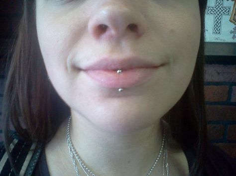 middle lip piercing Middle Bottom Lip Piercing, Underlip Peircings, Lip Ring Middle, Middle Lip Piercing Ring, Lip Peircings Middle, Verticle Labret Lip Piercing Aesthetic, Bottom Lip Piercing Middle, Lip Piercing Middle, Middle Lip Ring