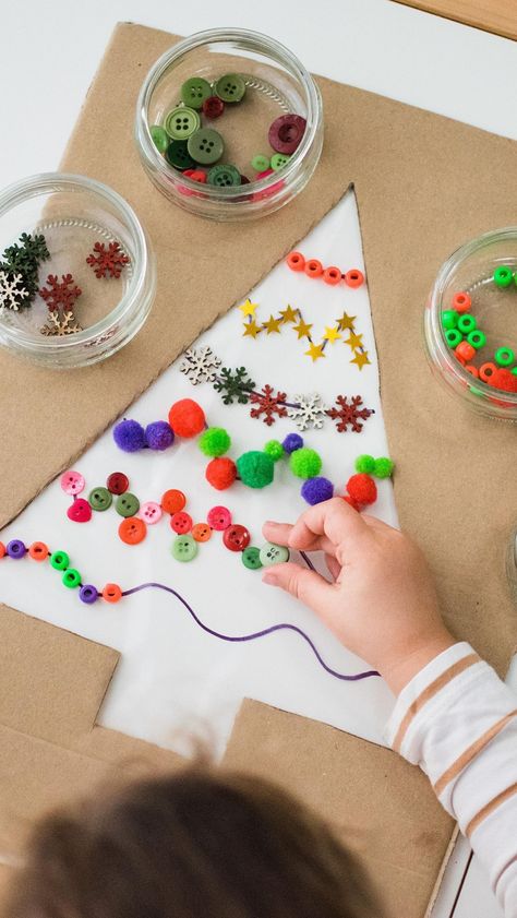 This activity is an old favourite of ours. It’s great for fine motor skills and a chance to get creative using any crafty bits you already… | Instagram Contact Paper Christmas Tree, Christmas Tree Fine Motor Activities, Sticky Back Plastic Ideas, Christmas Fine Motor Preschool, Christmas Tree Activities For Preschool, Fine Motor Christmas Activities, Christmas Tree Activities, Outside Christmas Tree, Christmas Fine Motor Activities