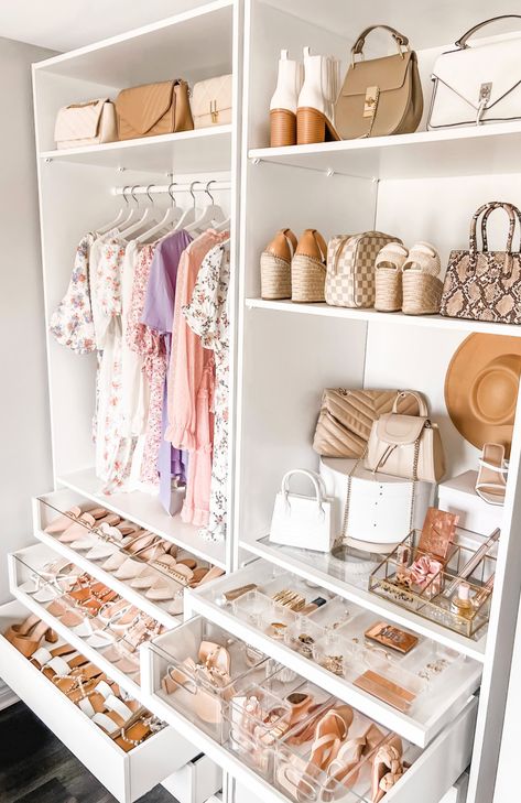 I am obsessed with my IKEA Pax closet! I used a ton of Amazon organizers to complete it! I love this neutral palette with pops of pink and purple! I displayed a ton of my low heels, neutral boots, small handbags, summer and spring dresses, womens fedora, crossbody bag, coffee table books and more! Prayer beads, home decor, belt organizer #AmazonFashion #FoundItOnAmazon #ClosetOrganization #OrganizeMyLife #ClosetOrganizers #SummerDresses #SpringDresses Diy Custom Closet, Ikea Pax Closet, Dressing Room Closet, Dream Closet Design, My Home Office, Closet Renovation, Closet Remodel, Closet Decor, Closet Room