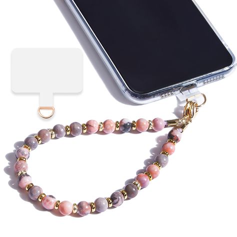 PRICES MAY VARY. Unique Design: Our phone wrist strap is crafted from pure natural stone beads, meticulously strung with durable thread and accented with 14K real gold electroplated metal between gemstones.Phone strap wrist ensures your phone stays secure yet easily accessible—a perfect solution for those needing quick phone access while keeping hands free. Multi-Functional: The wristlet for phone includes a versatile tether tab compatible with 90% of phone cases. Whether you're out clubbing, at Iphone Bracelet, Phone Bracelet, Phone Wrist Strap, Beaded Designs, Phone Wristlet, Fashion Beads, Natural Stone Beads, Phone Chain, Phone Strap