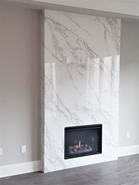 Fireplace: Calacatta Sintered Stone - Marble Trend | Marble, Granite, Tiles | Toronto | Ontario : Marble Trend | Marble, Granite, Tiles | Toronto | Ontario Neolith Calacatta, Fireplace Accent Walls, Fireplace Feature Wall, Granite Fireplace, Granite Tiles, Marble Trend, Feature Wall Living Room, Fireplace Tv Wall, Fireplace Built Ins