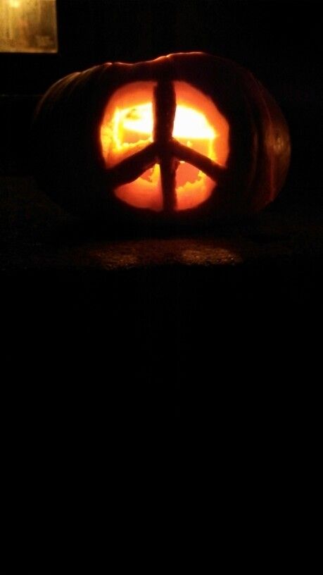 Peace sign pumpkin carving. Sun And Moon Pumpkin Carving, Peace Sign Pumpkin Carving, Peace Sign Pumpkin, Pumpkin Carving And Painting Ideas, Pumpkin Carving And Painting, Moon Pumpkin Carving, Moon Pumpkin, Pumpkin Carving Ideas, Pumpkin Carvings