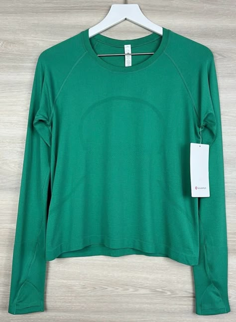 Lululemon Swiftly Tech Long Sleeve Race Length Size 8 💚 Emerald Ice EMIC/EMIC 52758 012624BNBB1 Condition is New With Tags. Shipped with USPS. Will combine shipping on multiple purchases and refund any shipping overage on orders shipped within the US (Combined shipping not available for separate Ebay International Shipping Orders please contact me for a bundle listing) . Cute High School Outfits, Lulu Tops, Back To School List, Anna Claire, Lulu Outfits, Coquette Jewelry, Preppy Wardrobe, Lululemon Swiftly Tech Long Sleeve, Bday Wish List