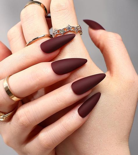 Deep burgundy shades bring fall vibes to your autumn nails this season. A classic fall nail design to warm up your look. #AutumnNails #FallNails Matte Almond Nails, Burgundy Shades, Long Stiletto, Nails Matte, Pumpkin Nails, Matte Nails Design, Almond Nails Designs, Burgundy Nails, Woman Wine