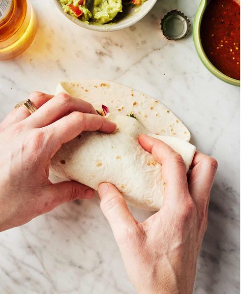 Learn how to fold a burrito! This simple guide will teach you how to roll a burrito that doesn't tear or fall apart while you eat. Fold A Burrito, Healthy Lunch Wraps, Burrito Recipe, Homemade Tortilla Chips, Lunch Wraps, Recipes Gluten Free, Dried Corn, Burritos Recipe, Homemade Tortillas