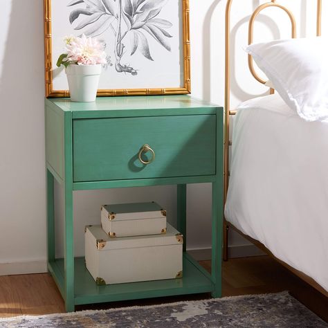 PRICES MAY VARY. Create a stylish and functional space with a Safavieh nightstand Beautifully crafted of acacia wood in a bold turquoise blue finish with gold accents Features one (1) ample drawer and a lower shelf ideal for books, magazines, and accessories Full dimensions are 21" wide x 17.1" deep x 26" high Safavieh has been a trusted brand in home furnishings for over 100 years, providing quality craftsmanship and unmatched style; Begin your rug and furniture search with Safavieh and explore Smart Bedroom, Shelf Nightstand, Contemporary Chic, Wood Nightstand, Extra Storage Space, Drawer Nightstand, Bottom Shelf, Furniture Outlet Stores, Nutrition Tips