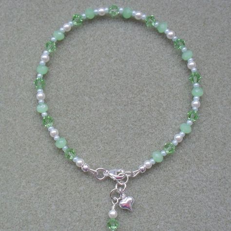 Pastel Green and White Beaded Anklet £6.00 Green And White Beads Necklace, Green And White Beaded Bracelet, Green Bracelet Beads, Green Bracelet Ideas, Beaded Bracelets Green, Small Beaded Bracelets, Summer Jewelry Diy, Bead Anklets, Diy Braided Bracelet