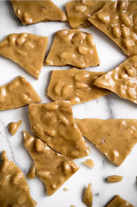 The secrets to making the best old-fashioned peanut brittle at home. Almond Brittle Easy, Peanut Brittle Recipe Old Fashioned, Soft Peanut Brittle Recipe, Homemade Christmas Treats, Homemade Peanut Brittle, Home Made Candy, Holiday Fudge, Peanut Brittle Recipe, Pistachio Biscotti