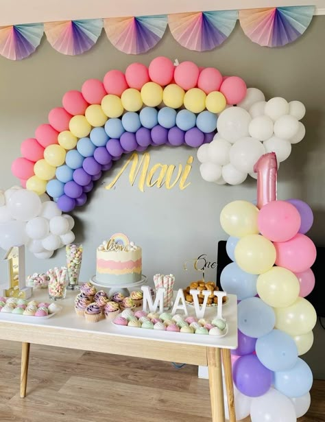 Rainbow Pastel Themed Birthday Party, Pastel Rainbow Balloon Decorations, First Birthday Party Rainbow, Rainbow Theme Balloon Decoration, Home 1st Birthday Party Ideas, Rainbow Balloon Decorations For Birthday, First Birthday Decorations At Home, Birthday Party Theme Decorations At Home, 1st Birthday Girl Rainbow Theme