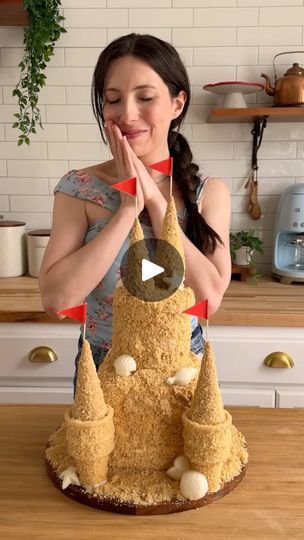 950K views · 20K reactions | Ice-cream Sandcastle! 🏖️ this would be so much fun for a party this summer! I made sure to freeze the ice-cream overnight in the deep freezer before assembling.

Ingredients:
-2 tubs ice-cream, one smaller than the other
-1 large package golden Oreos
-sugar cones
-cup cones
-corn syrup or honey 
-white chocolate melts
-flag toothpicks
-
Directions:

Note- Freeze the ice-cream in a deep freezer overnight the day before making. 

1. In a food processor, crush the Oreos into fine crumbs.
2. Brush corn syrup onto the sugar cones and roll in the cookie crumbs until well coated. (You can stack several cones together to make them taller.)
3. Melt the chocolate according to package directions, then pour into a shell mold. Chill until set.
4. Stack together the tubs of Sand Castle Cake, Sand Castle Cakes, Pumpkin Noodles, Soiree Ideas, Ice Cream Cone Cake, Chocolate Melts, Deep Freezer, Cake Borders, Sugar Cones