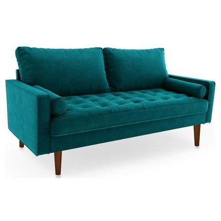 Whether you're looking for chic and modern or vintage romance in your living room decor, this contemporary tufted loveseat is a perfect choice. It's upholstered in gorgeous velvet, creating a soft look and feel you're going to love. Tufting adds dimension and depth to a foam seat cushion, while loose back pillows add comfort. Two bolster pillows are a charming addition, perfectly complementing a sleek profile and square track arms with tempting curves. Four tapered wooden legs create wonderful h Modern Velvet Sofa, Black Phillip, Tufted Loveseat, Metal Sofa, Bolster Pillows, Tufted Bench, Velvet Loveseat, Eucalyptus Wood, Wood Sofa