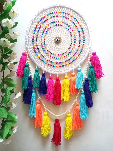 Rainbow Evil Eye Tassel Dreamcatcher Evil Eye Dreamcatcher, Dream Catcher Ideas, Rainbow Evil Eye, Rainbow Dream Catcher, Dreamcatcher Baby, Handmade Dream Catcher, Dream Catcher Nursery, Dream Catcher Art, Crochet Idea