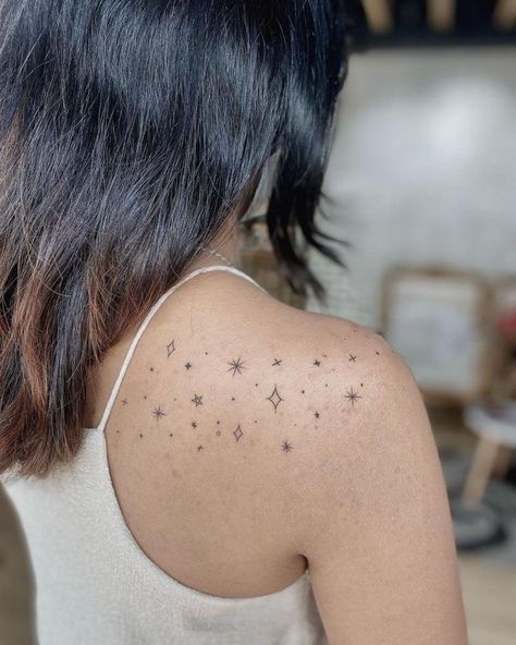 Back Stars Tattoo Women, Back To Collar Bone Tattoo, Classy Star Tattoo, Firefly And Star Tattoo, Stars Sleeve Tattoo For Women, Stardust Tattoo Shoulder, Star Clavicle Tattoo, Sparkle Tattoo Ideas Shoulder, Star Freckle Tattoo Arm