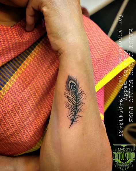 Krishna Related Tattoo, Peacock Feather Tattoo Design For Women, Krishna Tattoo Small For Women, Peacock Tattoo Feather, Krishna Feather Tattoo, Morpankh Tattoo, Peacock Feathers Tattoo, Mor Pankh Tattoo, Peacock Feather Tattoo Design