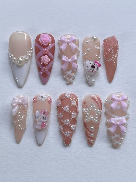 Hello Kitty Nails 🌸 Hello kitty nails #zicxa-photos #zicxa #images #background #wallpaper #freepik #shutterstock #VN Pink Girly Nails, Corset Nails, Nails Hello Kitty, Aesthetic Nail Art, Coquette Nail, Nails Girly, Princess Vibe, Hello Kitty Nails Art, Girly Nails