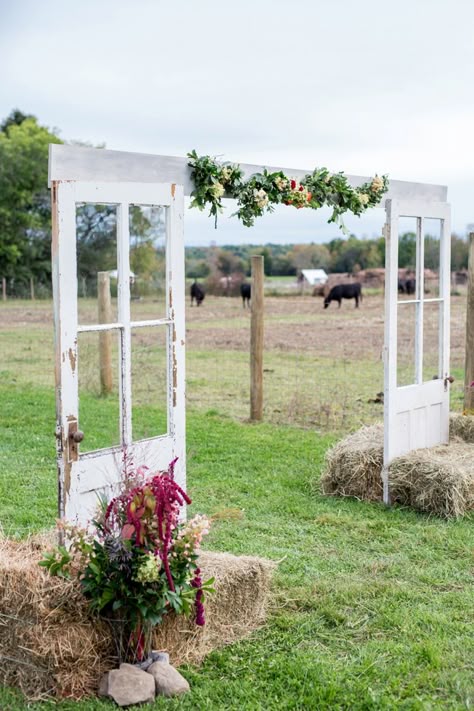 A Rustic Boho Wedding in New York via TheELD.com Old Doors Wedding, Hay Bale Wedding, Rustic Wedding Details, Wedding Arch Rustic, Wedding Doors, Rustic Farm Wedding, Wedding Entrance Decor, Rustic Boho Wedding, Rustic Outdoor Wedding