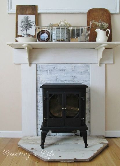 diy faux fireplace mantel, fireplaces mantels, living room ideas, repurposing upcycling, shelving ideas Mantel Update, Fake Fireplace Mantel, Faux Foyer, Electric Wood Stove, Pellet Stove Ideas, Diy Fireplaces, Wood Stove Surround, Faux Fireplaces, Electric Fireplace With Mantel