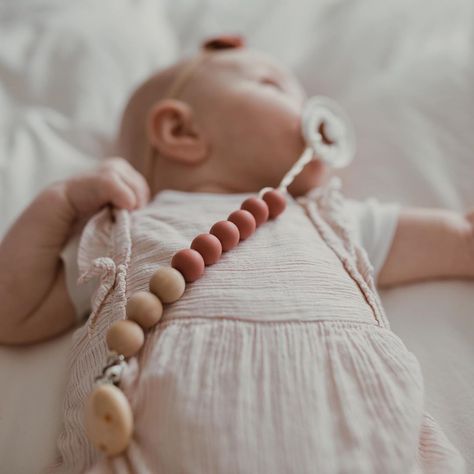 teeethies~handmade baby goods’s Instagram photo: “pretty in pink ✨💗🌸🎀⁣ ⁣ ronnie is looking so cute in our scottie pacifier clip! 🥰 grab one today and never lose your babes binky again! ⁣” Custom Pacifier, Soother Holder, Blush And Grey, Dummy Clips, Pacifier Clip, Baby Design, Baby Name, Kids Branding, Baby Boutique