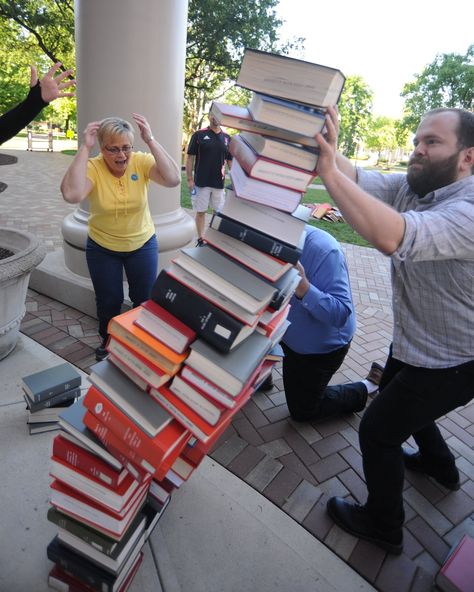 Library Olympics at University of Dayton, August, 2016 :  )It was the second year of the Library Olympics, which features events such as The Journal Toss, which involves flinging to-be-recycled journals at a target; Speed Sort, in which competitors organize books on a cart as fast as possible (in correct Library of Congress order); and Cart Racing. Also, the balance beam, in which a book is balanced on a head. See photos. Summer Reading 2024 Adventure Begins At Your Library, Cslp Summer Reading 2024, Library Programs For Adults, Library Olympics, Public Library Programs, Book Themed Birthday Party, Olympic Idea, Kids Olympics, Storytime Ideas