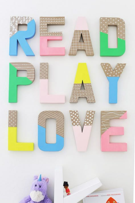 Super easy colorful wall letters. Love these for a playroom! Diy Letters For Wall, School Bulletin Boards Elementary, Diy Wall Letters, Kids Letters, Paper Mache Letters, Playroom Wall Decor, Wall Letters, Diy Letters, Kids Wall Decor