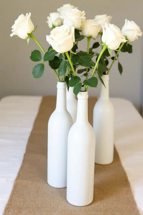 22 Simple Wedding Centerpieces That’ll Wow Your Guests Rustic Birthday Parties, Monochromatic Flowers, Wedding Cake Centerpieces, Cake Centerpieces, Rustic Birthday, Small Flower Arrangements, Simple Wedding Centerpieces, Bottle Centerpieces, Winter Wedding Cake