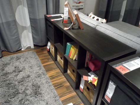 Ikea Kallax (used to be Expedit) cube bookcase as a sofa table - Want! Ikea Showroom Kallax Behind Sofa, Kallax Console Table, Kallax Bookcase, Kallax Ideas, Ikea Showroom, Behind Sofa, Rustic Entryway Table, Reclaimed Wood Console Table, Ikea Ideas