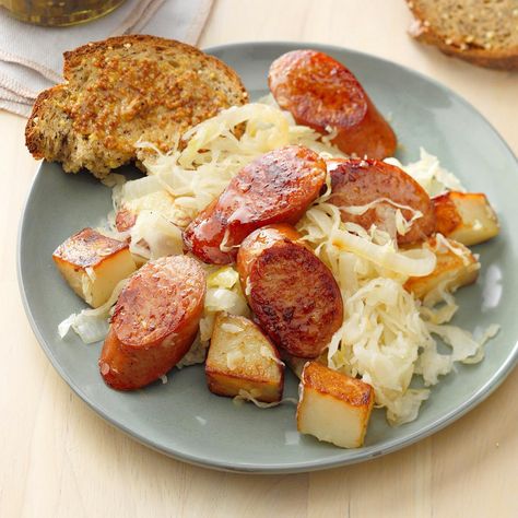 I created this tasty quick-and-easy dish so I can throw it together in no time on those extra-busy nights. — Mary Lyon, Spotsylvania, Virginia Sausage And Sauerkraut, Sausage And Potatoes, Homemade Sauerkraut, 5 Ingredient Dinners, Sausage Dishes, Sauerkraut Recipes, Sausage Potatoes, New Year's Food, Smoked Sausage