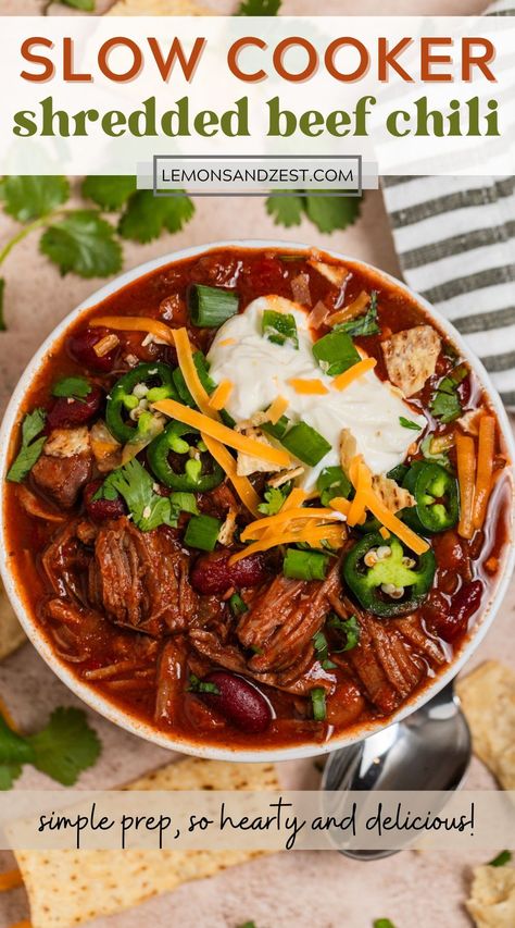 If you love tender, pull apart, melt in your mouth beef, then this Slow Cooker Shredded Beef Chili recipe is going to be a new favorite! Warm and cozy chili spices flavor this beef that falls apart and will warm you up with each bite. Beans and veggies added to make this a complete meal in a bowl--ready for lots of toppings! Chili Recipe Crockpot Chuck Roast, Shredded Beef Chili Crockpot, Leftover Roast Beef Chili, Chili With Chuck Roast Crock Pot, Chili With Shredded Beef, Crockpot Shredded Beef Recipes, Chuck Roast Chili Recipes, Steak Chili Recipe Crockpot, Shredded Beef Chili Recipe