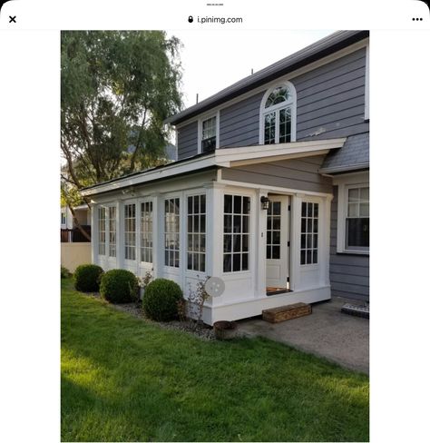 Garage Sunroom Conversion, Farmhouse Sunroom Exterior, Deck Sunroom Enclosed Porches, Colonial Sunroom Addition, Exterior Sunroom Addition, Front Room Addition To House, Sunroom Over Garage, Sunroom Dining Area, Bungalow With Sunroom