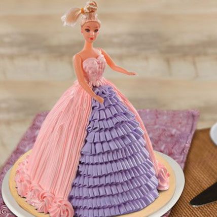 Send Barbie Floral Dress Cake Online in India at Indiagift.in Doll Dress Cake, Princess Dress Cake, Purple Barbie, Barbie Dress Cake, Doll Cake Designs, Princess Doll Cake, Bolo Rapunzel, Barbie Doll Birthday Cake, Barbie Doll Cake