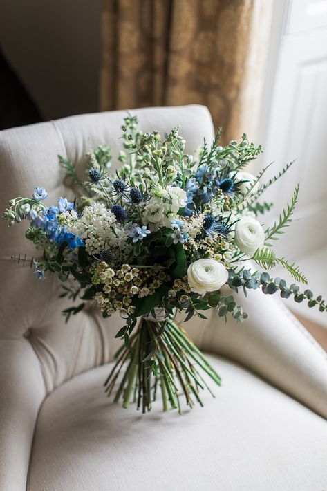 Bridal bouquet/ white/shades of blue / rannunculus/thistle/euco/roses/natural style