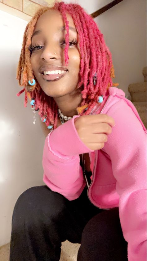 Pink And Blonde Dreads Black Women, Pink Short Locs, Pink And Red Dreads, Pastel Locs Black Women, Hot Pink Locs Black Women, Brown And Pink Locs Black Women, Pink And Blonde Locs Black Women, Ginger And Pink Locs Black Women, Pink And Blond Locs